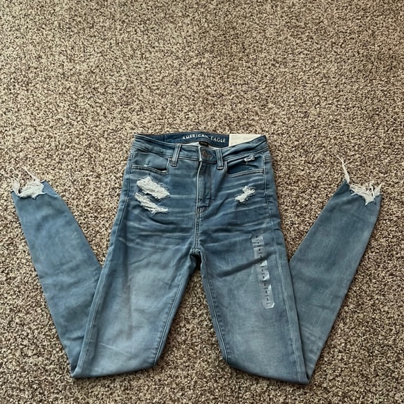 I am selling American Eagle high rise jeans. They are blue and a size 2 - Picture 1 of 3